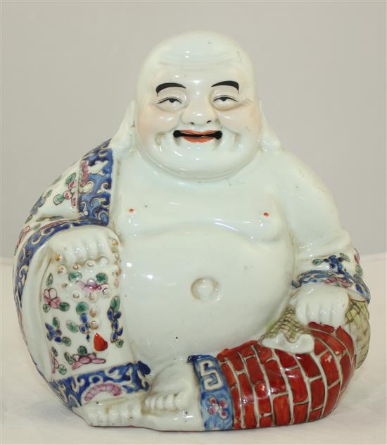 A Chinese famille rose seated figure Budai, Republic period, 20cm